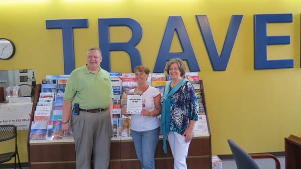 Another free trip winner with WJBD Radio's Bruce Kropp, Tina who is going to Las Vegas and Jeannell Charman of Salem Travel.