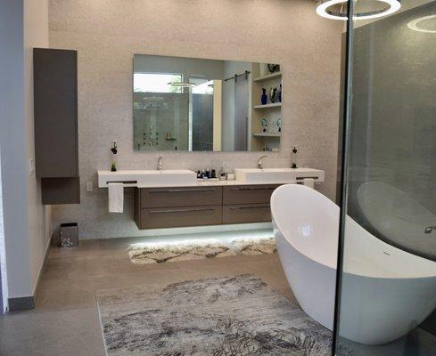 Custom bathroom with floating vanity and medicine cabinet