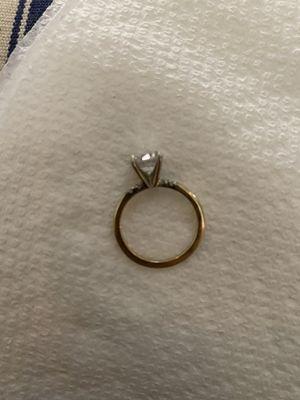 My engagement ring after corwin worked on it you can see the difference in the middle in the crown it is not the same at all