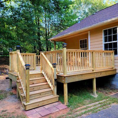 Out with the old in with the new,  nothing like a classic pine deck. Spruced up with solar lighting!