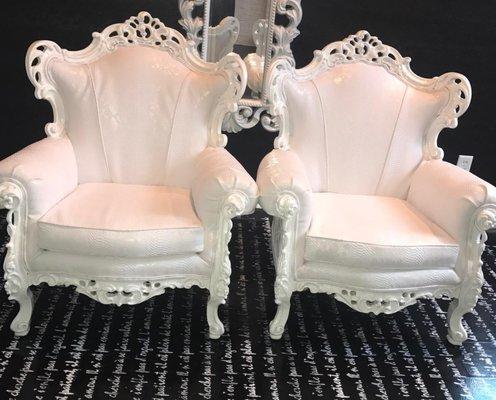 Our vintage Rococo chairs were remixed with faux white snakeskin and are available for rent for special events.