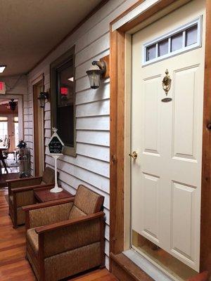 Inn Hallway with individual doors to rooms