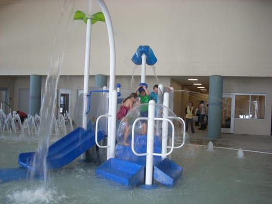 Play Structure in Zero Depth Entry Pool.  Also Enjoy our 20 foot loop slide, Sauna, Steam Room, Hot Tub!