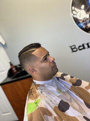 Bald fade with a hard part