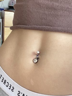 Botched piercing that's already rejecting 2 hours after it was done.