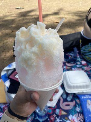 Lychee and coconut shaved ice topped with condensed milk (I think).