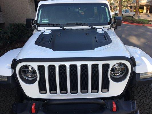 Vinyl Wrapped hood accent and vinyl trimming around the grill