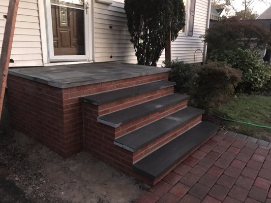 New brick steps with bluestone treads and thermal bluestone platform