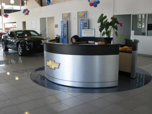 The receptionist desk is a great place to start to get around the dealership.