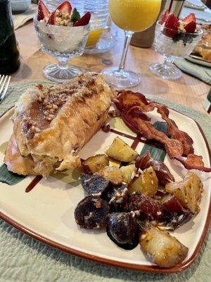 Delicious French Toast Breakfast with home fries and bacon