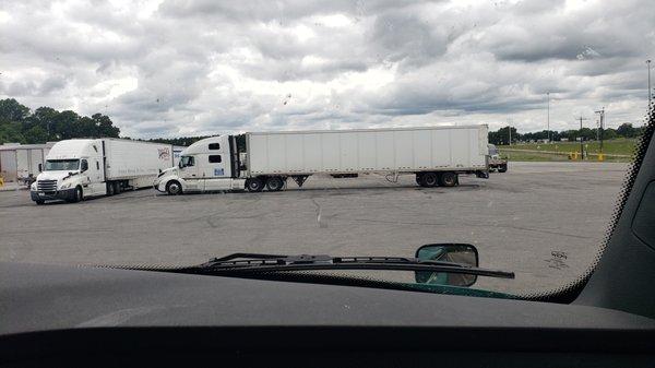 Look at this a**hole from y'all company parked and sleeping at Love's at 2050 Hwy 70 E, Jackson, TN 38305 on 7/7 at 13:00.