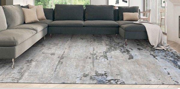 We offer room setting images for many of our modern rugs in order to help you better visualize how a rug could look in your setting.