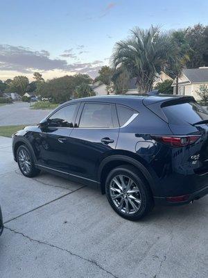 Front windows tinted to match factory rears.