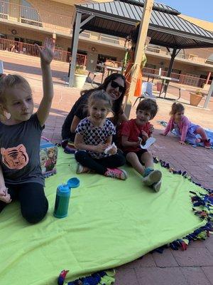 Muffins with momma morning and story time in the courtyard.