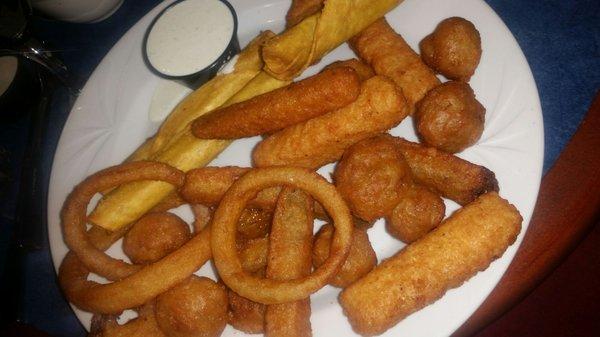 Samplers  platter Genie, onion rings, taquitos, mushrooms, zucchini sticks, mozzarella sticks