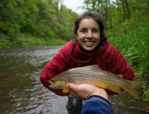 Happy customer fly fishing with one of our guides on the Kinni River!