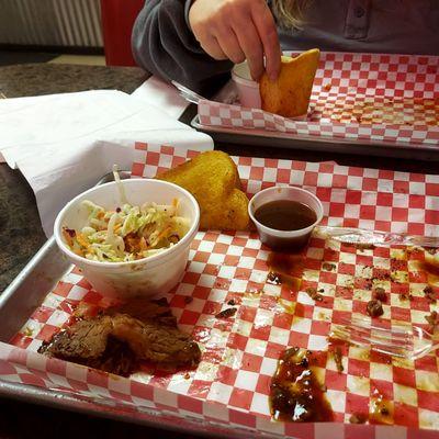 Remains of brisket coldslaw and garlic bread