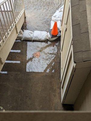 So every time It rains, we flood at the bottom of the stairs because there's no drainage