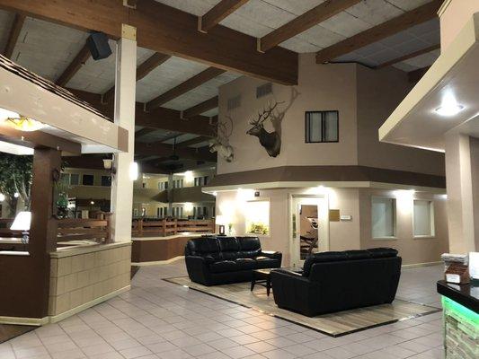 Lobby area with pool and jacuzzi in the center