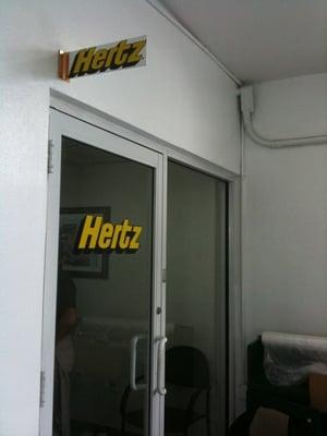 Hertz located in the Warren Henry Volvo Dealer.