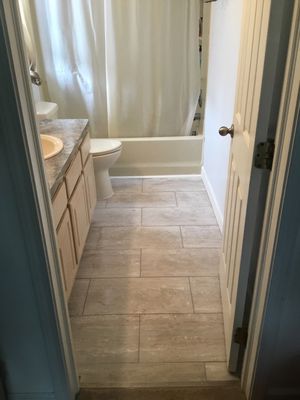 This is after we installed the tile and grout and new toilet