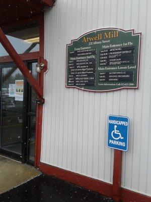 The Atwell Mill building signage by the door you will enter