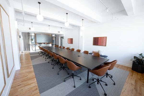 Our boardroom adapts an old "fur vault" from the building's historic department store roots, complete with the original vault frame door.