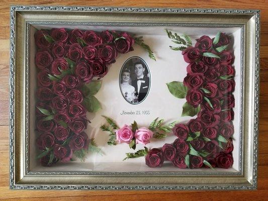 Before he passed he gave his wife a big arrangement of Roses. We preserved and framed the Roses in this beautiful Memorial Shadow Box.