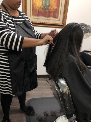 Stylist working on a client