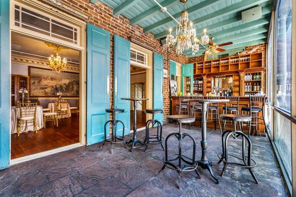 The Mezzanine Bar features a mahogany cocktail bar and exposed brick.