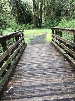 Bridge to grass field/movie area