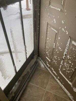 Snow blocked screen door.