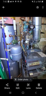 Laars boiler with 100 gallon indirect water heater boiler heats  coils on the inside of the tank to make hot water. This is at a laundromat.