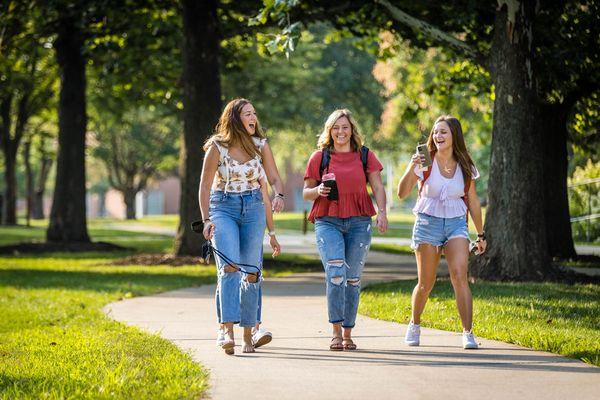 Students walk to class through the Missouri Arboretum.