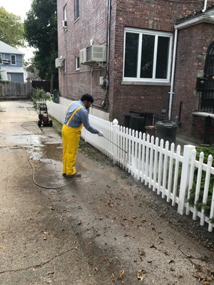 Power washing vinyl fence