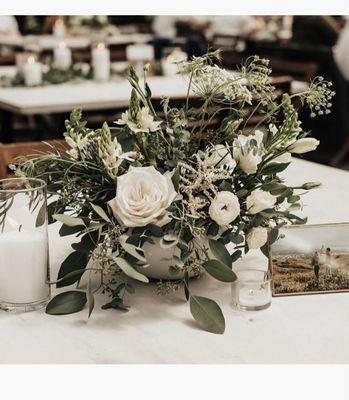 Tables details inside a Glasshouse wedding reception.