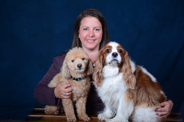 Dr. Kim Wilke with her two dogs: Charlie, a miniature Poodle, and Teddy, a Cavalier King Charles Spaniel