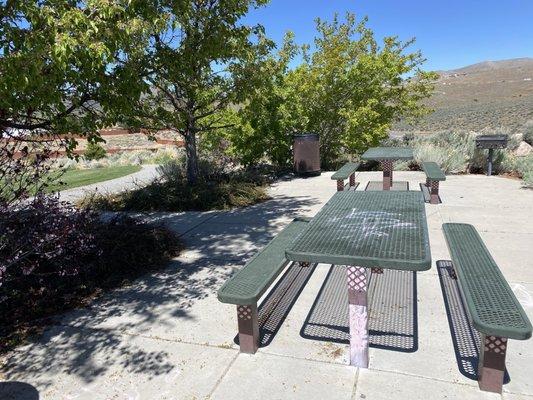 Secluded picnic tables.