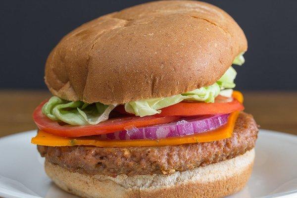 Beyond Meat Vegan Burger in a gluten free bun.  You choose your veggies and condiments.