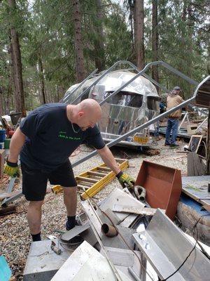 Aaron sorting the debris into piles.  He is so organized.