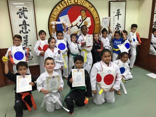 Proud students after earning new belts!