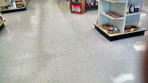 A before and after shot of a commercial floor care project for a Bloomington retail business.