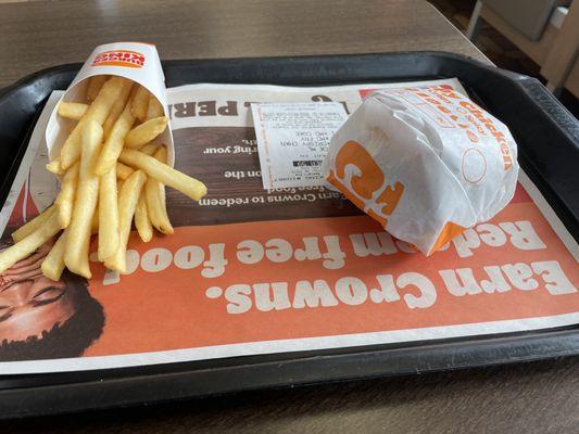 Chicken sandwich meal w/ fries and lemonade.