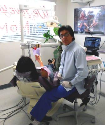 Dr. Mario Robles during a patient check-up