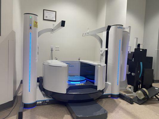 Super duper spinning standing talking donkey test apparatus.  It is a vertical CT scan machine in all actuality.