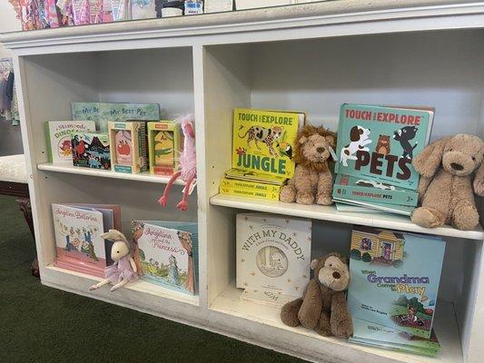 Large selection of books and jelly cats