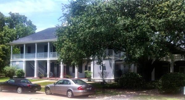 Parish House located just to the left of All Saints' Episcopal Church in River Ridge, La