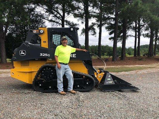 Dean and his trusty skid steer!