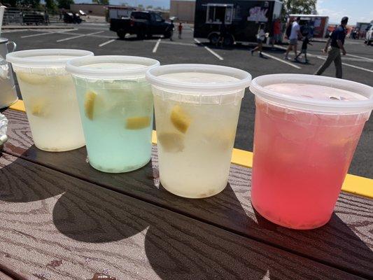 Different flavors of lemonades and limeade's