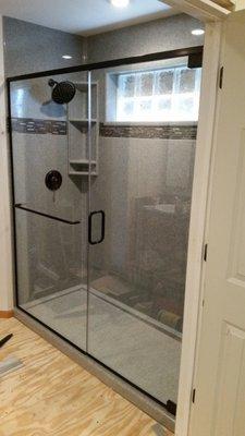 Bathroom remodel in Onyx solid surface.